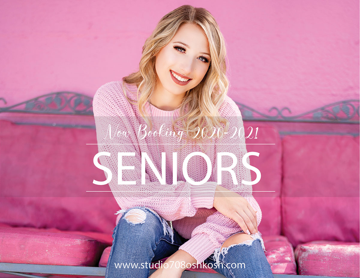 high school senior girl sitting on hot pink bench